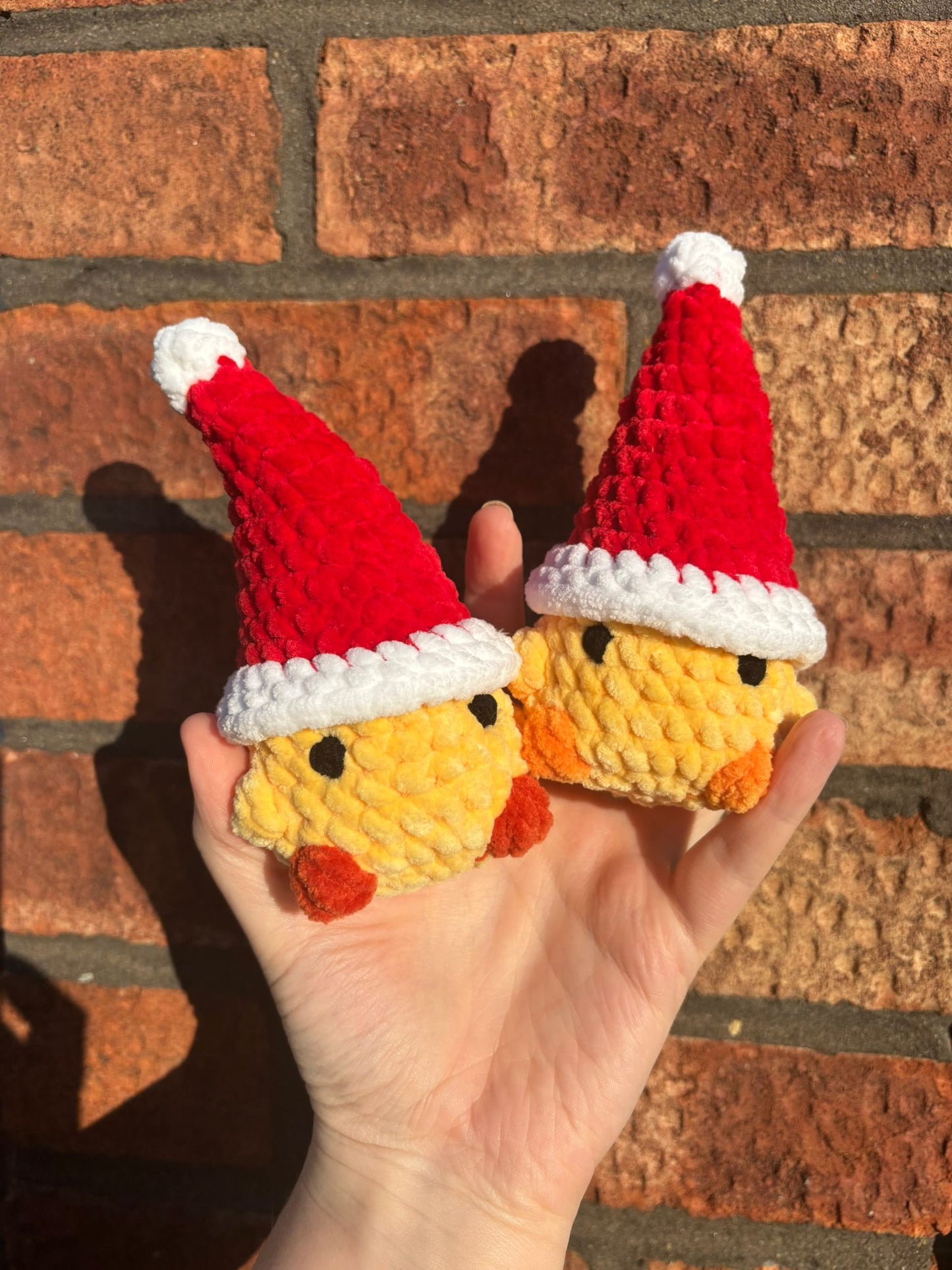 Crochet Christmas Chick - chicken plushie wearing a santa hat