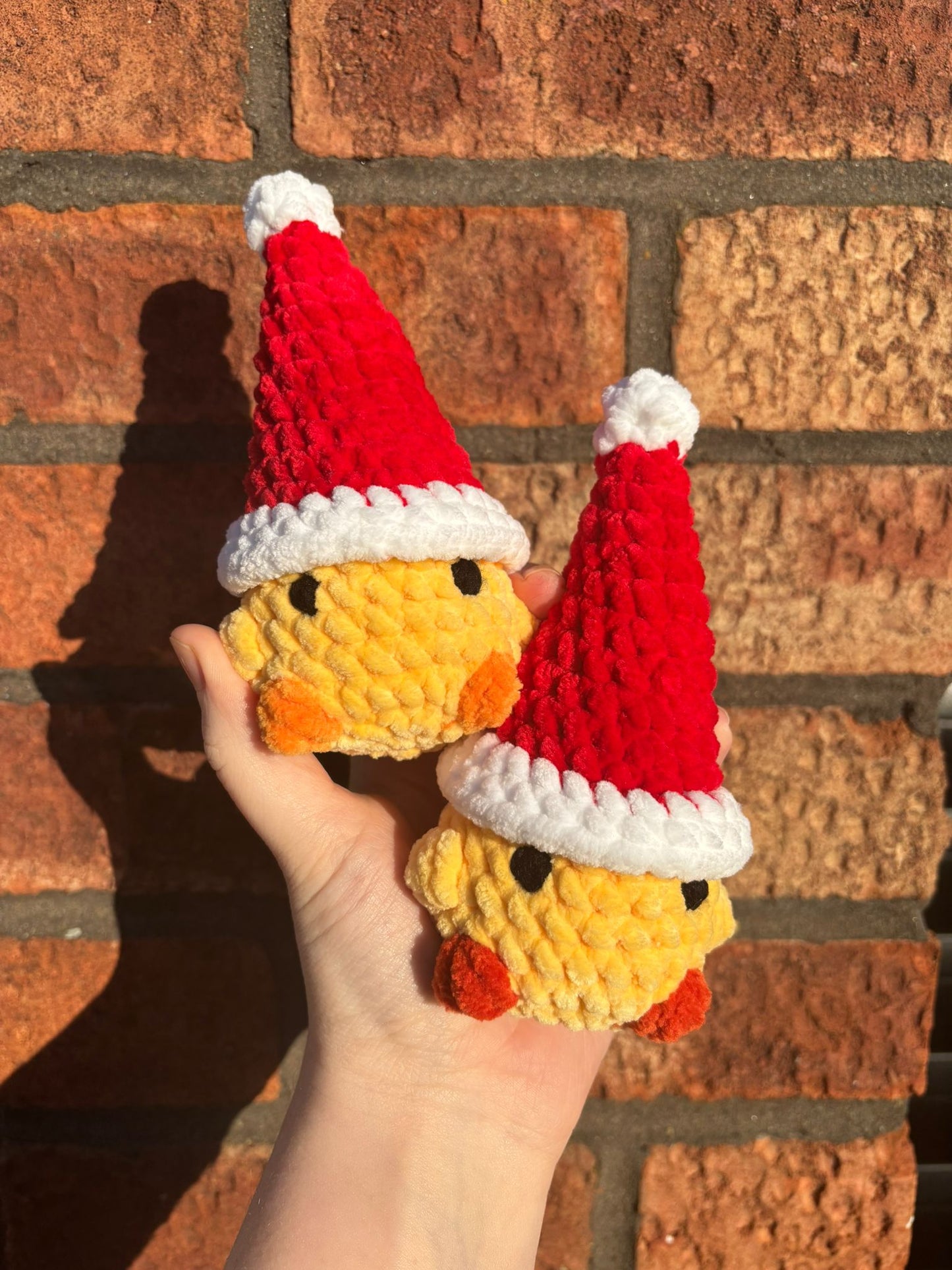 Crochet Christmas Chick - chicken plushie wearing a santa hat